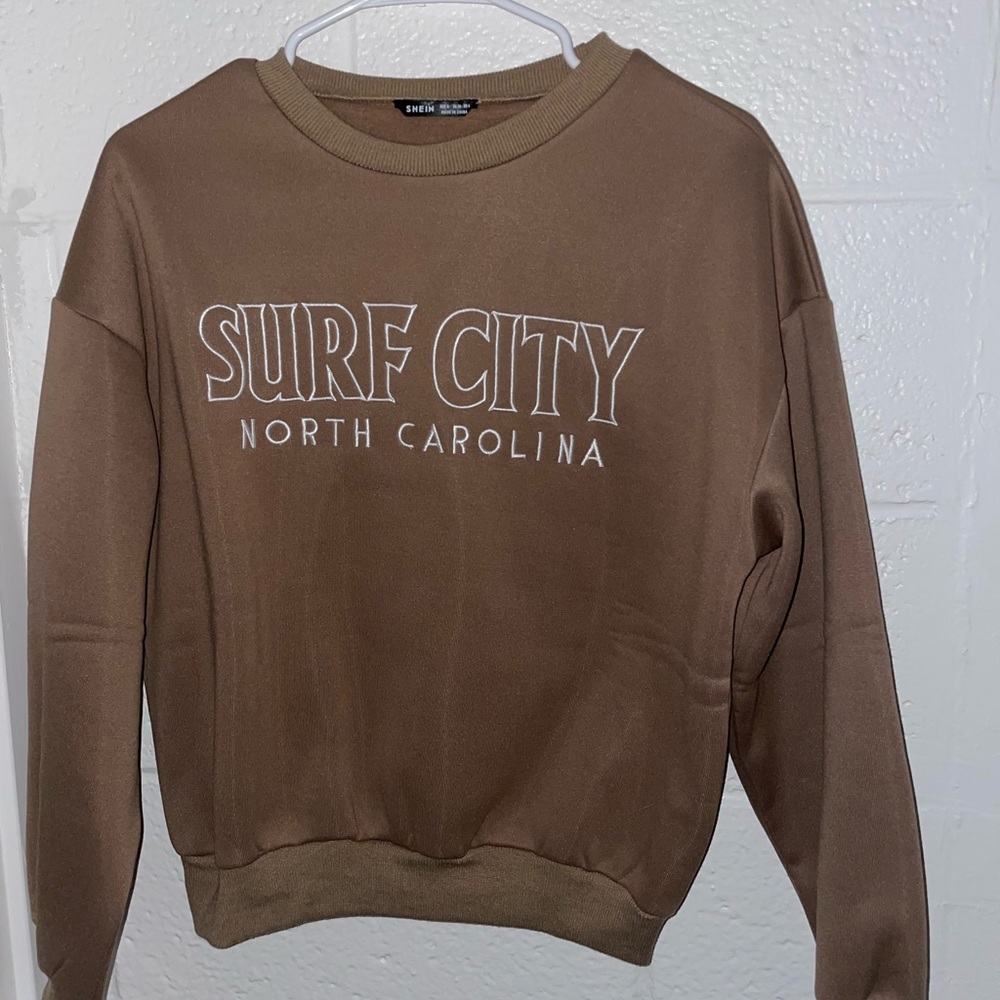 Brown sweater